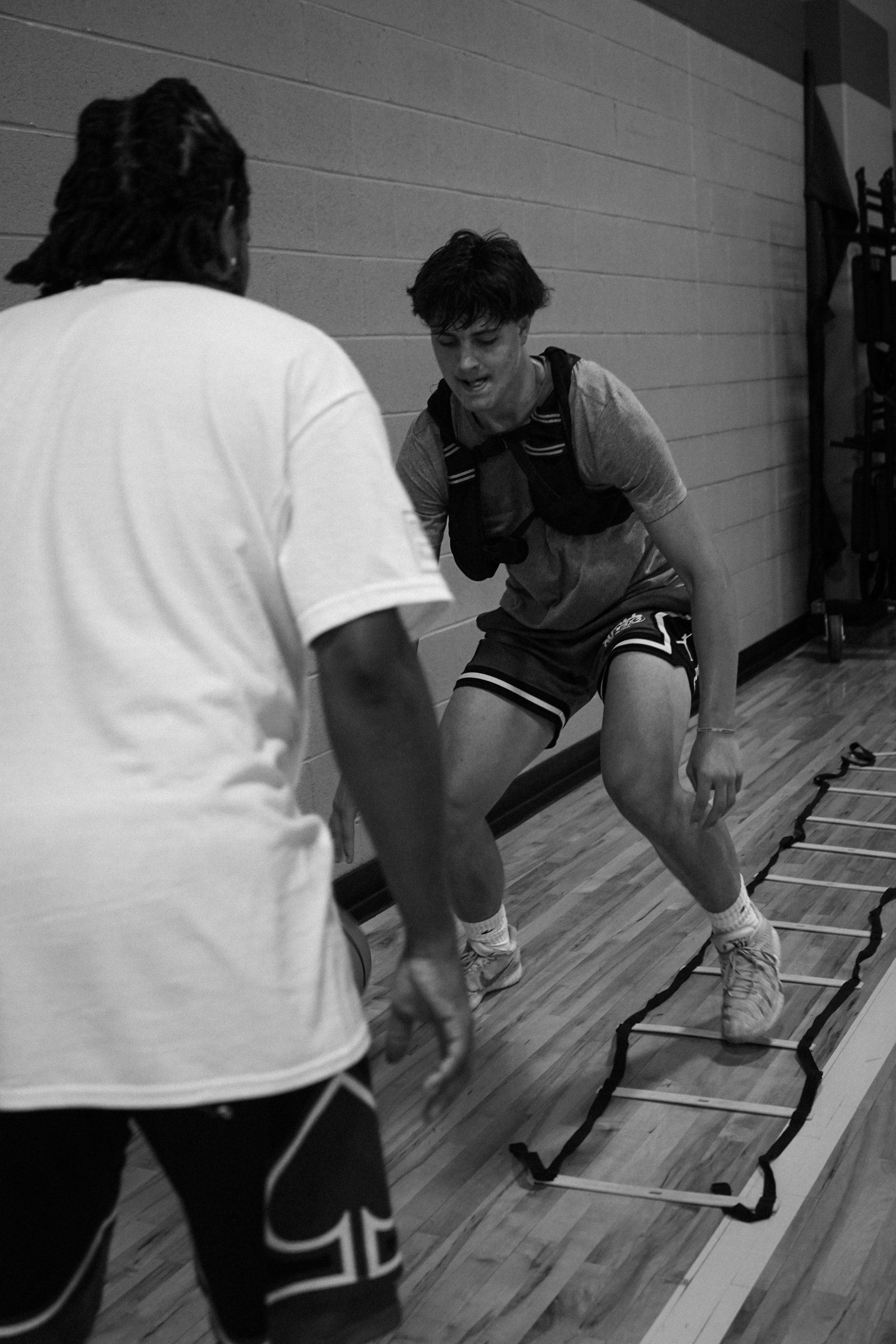 Basketball player training in gym